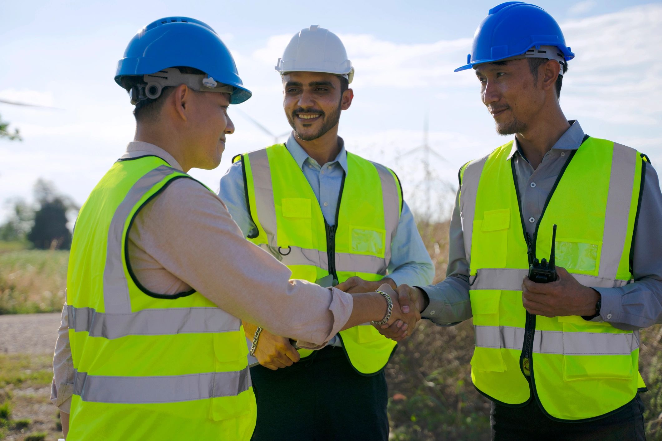 Blue collar workers at an electricity infrastructure site